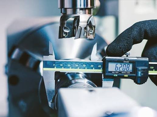 Engineers Inspecting Precision Components